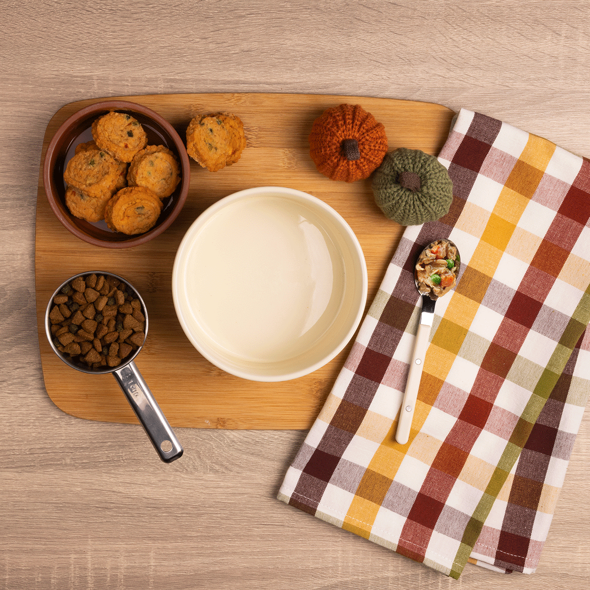 A GIF shows the ingredients being mixed to create a dog-friendly recipe.